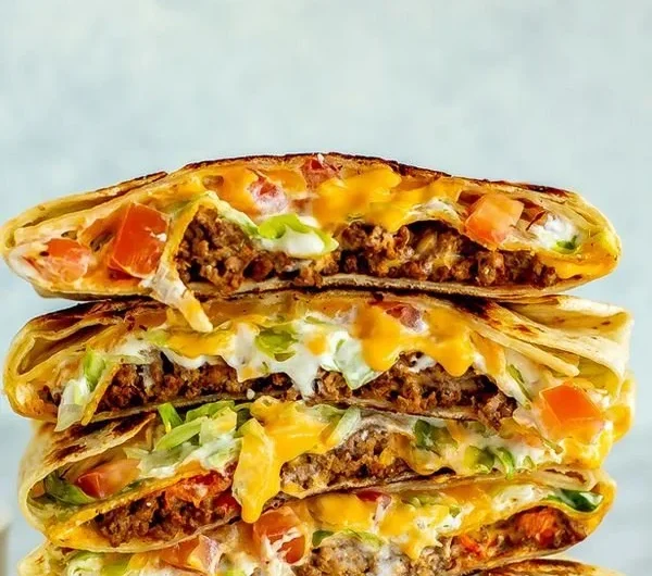 Homemade Copycat Crunchwrap Supreme loaded with toppings and flavors