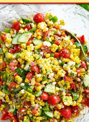 Colorful corn salad with fresh vegetables and herbs