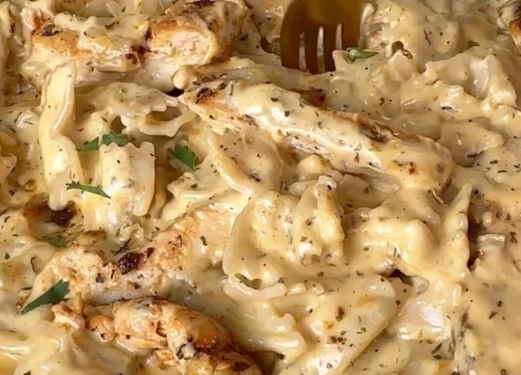 Delicious Dairy Free Chicken Alfredo meal served with pasta and vegetables