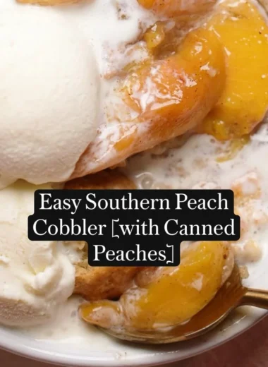 Delicious easy Southern peach cobbler served warm with a scoop of vanilla ice cream