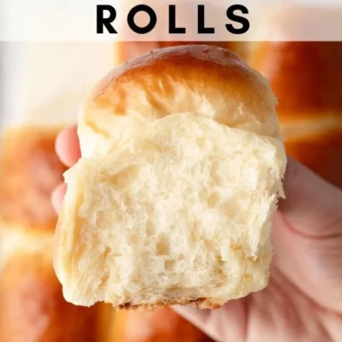 Freshly baked sweet Hawaiian bread rolls on a wooden table