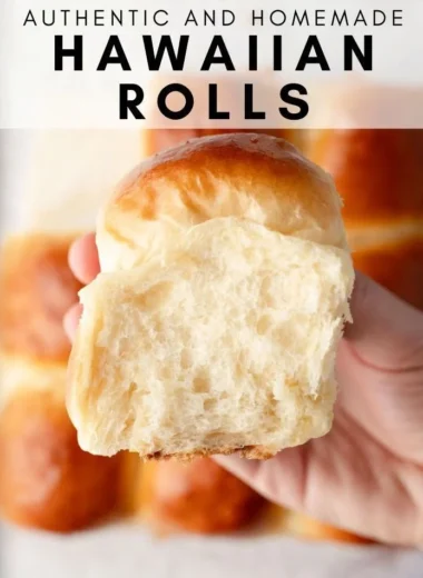 Freshly baked sweet Hawaiian bread rolls on a wooden table