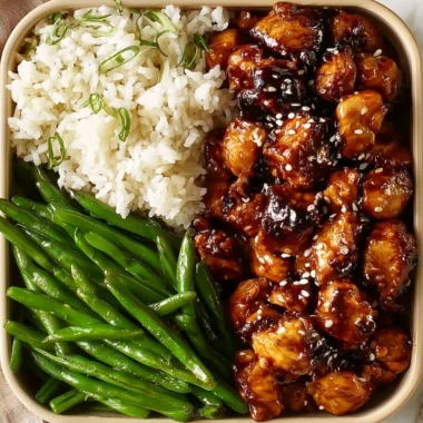 High protein Asian sesame chicken dish with sesame seeds and vegetables
