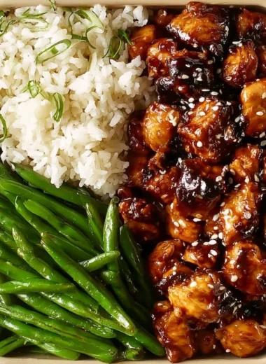 High protein Asian sesame chicken dish with sesame seeds and vegetables