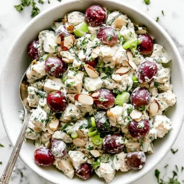 Delicious chicken salad served in a bowl with fresh ingredients