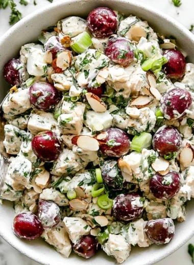 Delicious chicken salad served in a bowl with fresh ingredients
