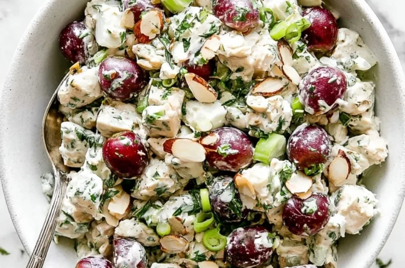 Delicious chicken salad served in a bowl with fresh ingredients