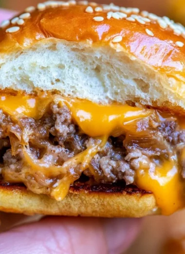 Delicious cheeseburger sliders served on a platter with toppings