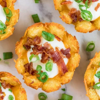Loaded Tater Tot Appetizer topped with cheese and savory toppings