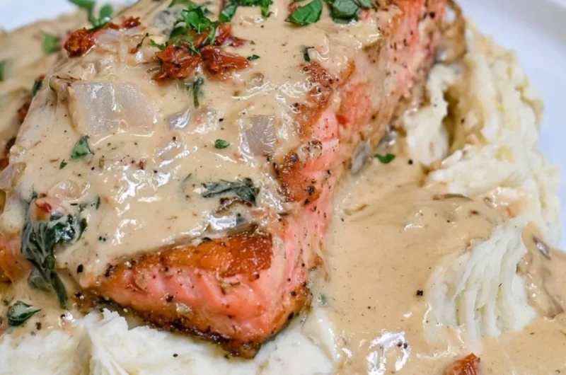 Delicious Marry Me Salmon dish garnished with herbs and served on a plate.