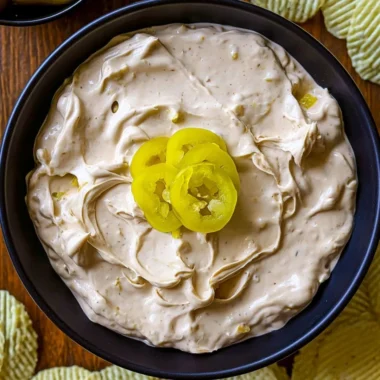 Delicious Mississippi Pot Roast Dip served with crispy chips for dipping