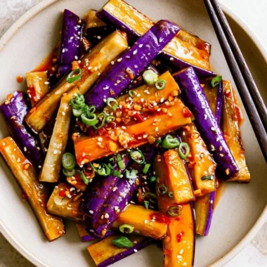 Plate of Spicy Eggplant Stir Fry with colorful veggies and spices