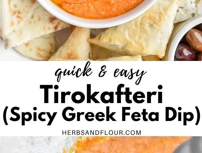 Spicy Greek feta dip served in a bowl with fresh veggies and pita chips.