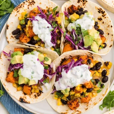 Delicious sweet potato and black bean tacos served with fresh toppings
