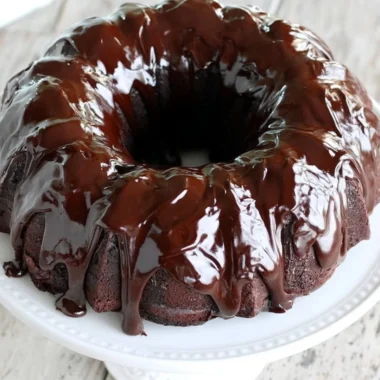 Cozy chocolate sour cream pound cake with a rich chocolate glaze