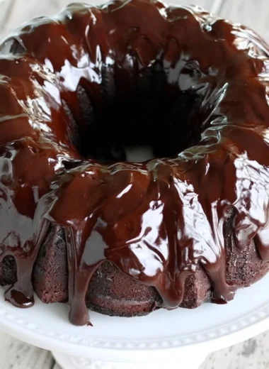 Cozy chocolate sour cream pound cake with a rich chocolate glaze