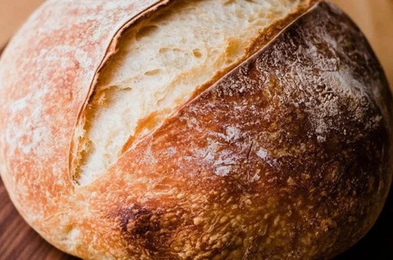 Homemade sourdough bread loaf fresh out of the oven.