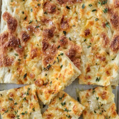 Cozy Gruyère and thyme Italian focaccia bread, fresh out of the oven.