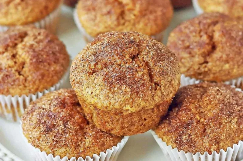 Freshly baked cozy pumpkin muffins ideal for autumn evenings