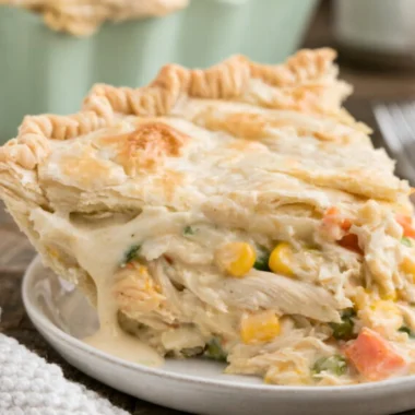 Delicious easy semi-homemade chicken pot pie with flaky crust and savory filling.
