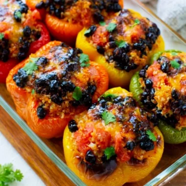 Colorful vegetarian stuffed peppers filled with rice and vegetables