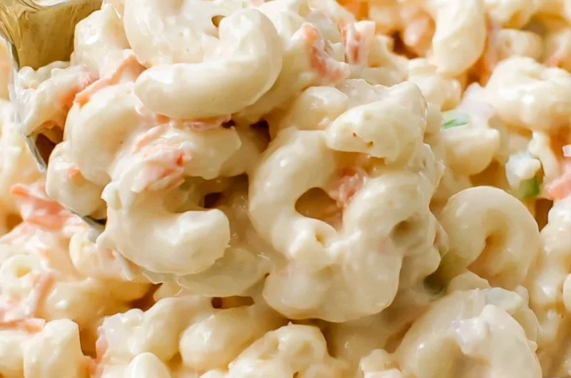 Bowl of creamy Ono Hawaiian BBQ macaroni salad with vegetables.