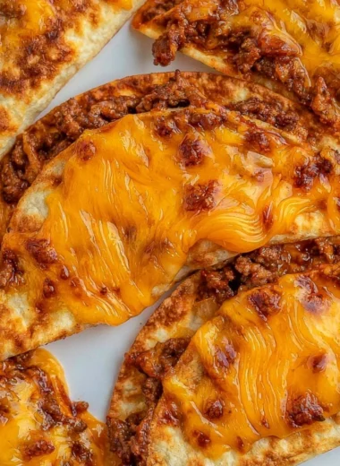 Delicious sheet pan tacos ready to serve, featuring vibrant toppings and flavors.