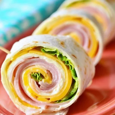 Delicious ham and cheese pinwheels on a platter