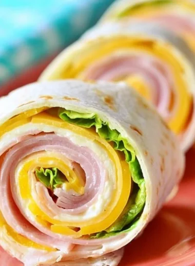 Delicious ham and cheese pinwheels on a platter