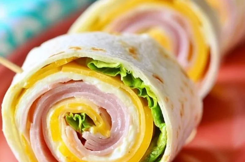 Delicious ham and cheese pinwheels on a platter