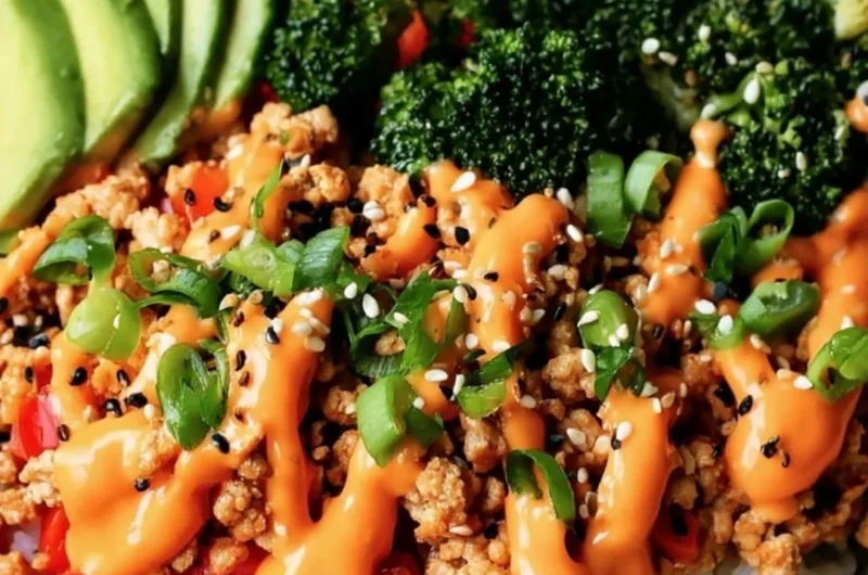 Delicious Bang Bang Turkey Bowls served in a colorful bowl with fresh ingredients.