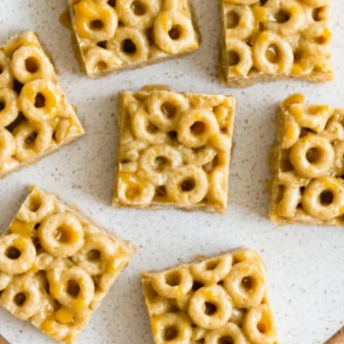 No Bake Peanut Butter Cheerio Bars with chocolate drizzle on top