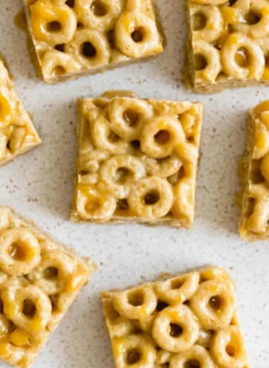 No Bake Peanut Butter Cheerio Bars with chocolate drizzle on top
