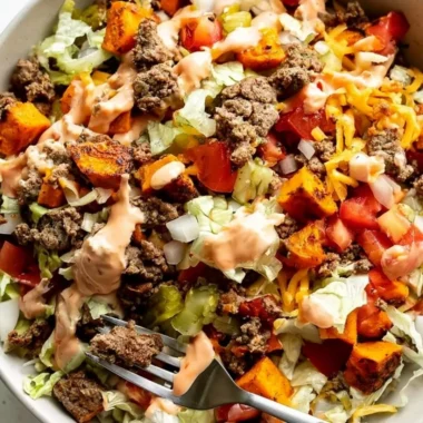 Sweet Potato Burger Bowl with fresh vegetables and toppings