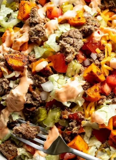 Sweet Potato Burger Bowl with fresh vegetables and toppings