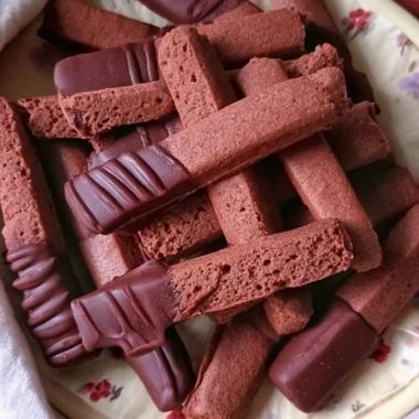 A delicious plate of homemade French chocolate shortbread cookies.