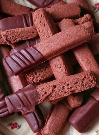 A delicious plate of homemade French chocolate shortbread cookies.